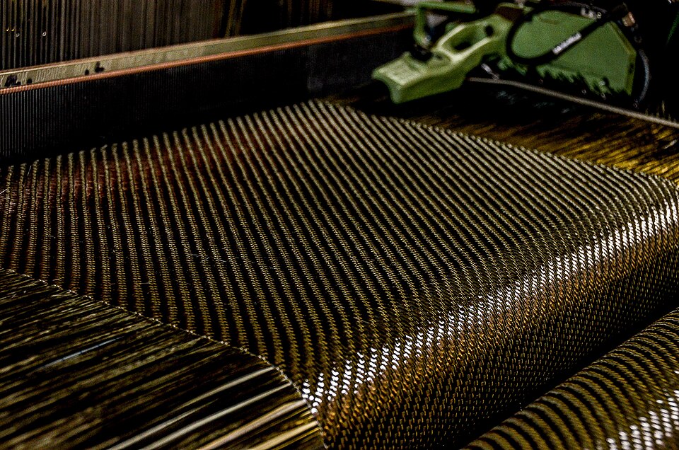 Carbon fibre composite weave, relevant to coatings, adhesives and composite cure state analysis.
